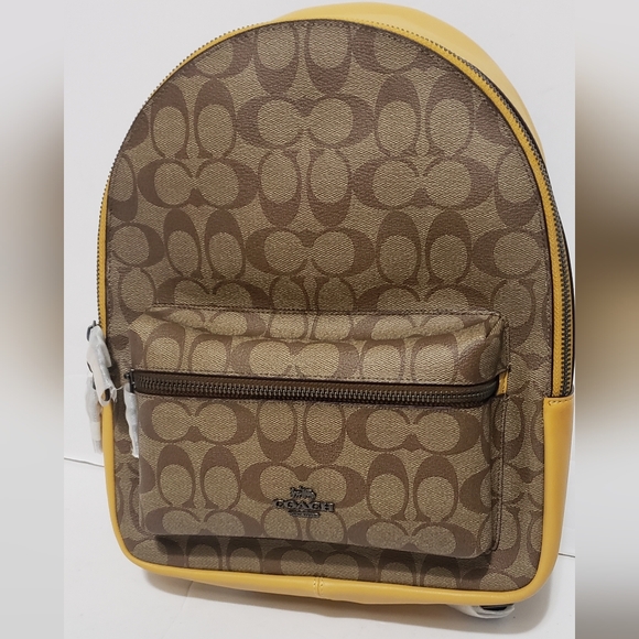 Coach Handbags - Coach Brown and Yellow Backpack